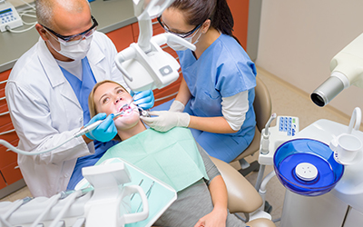 Female patient having a dental procedure done